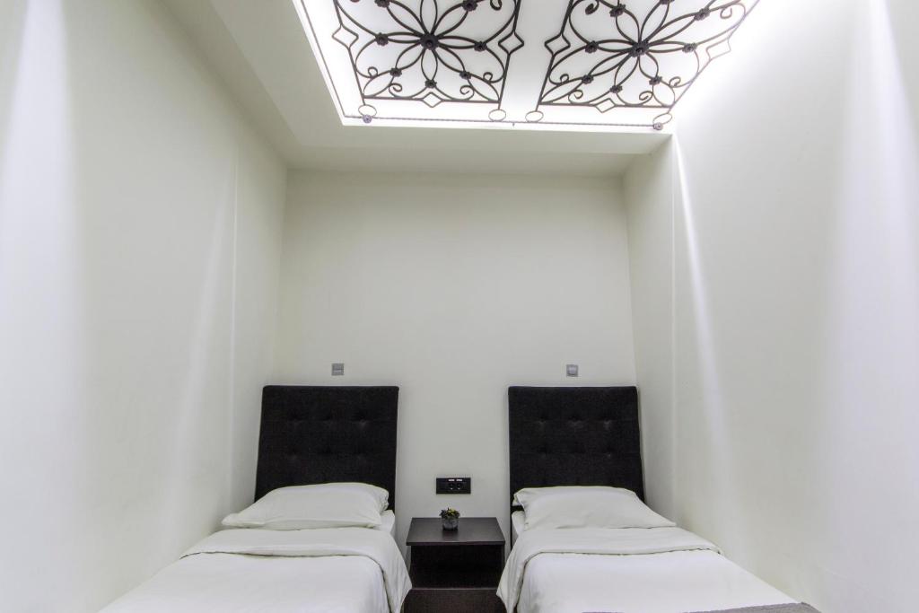Madison - Square Sava - Economy Twin Room - Basement