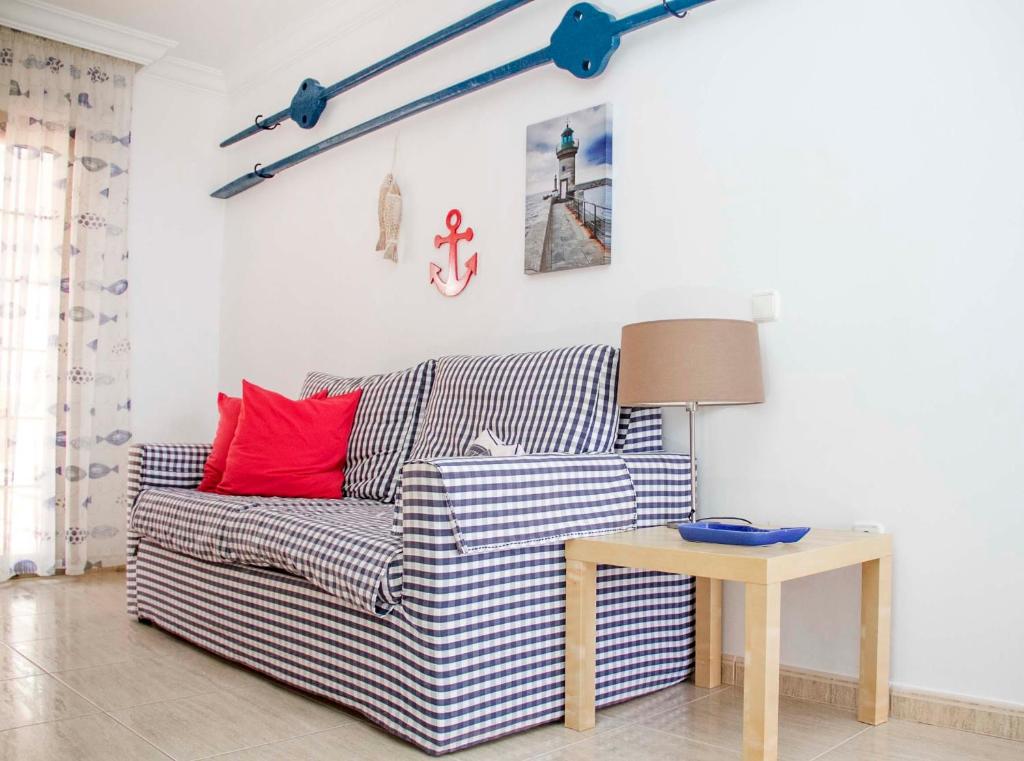 Posedenie v ubytovaní Navy Apartment, El Poris
