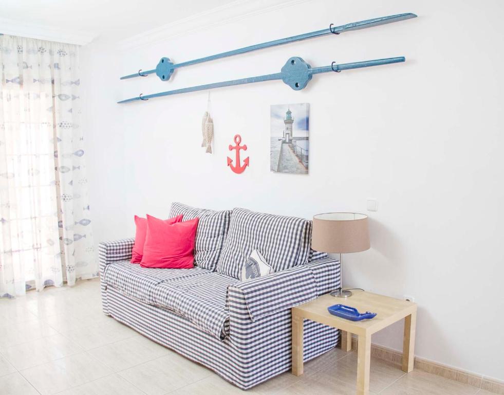 Posedenie v ubytovaní Navy Apartment, El Poris