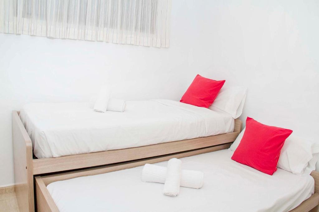 Posteľ alebo postele v izbe v ubytovaní Navy Apartment, El Poris