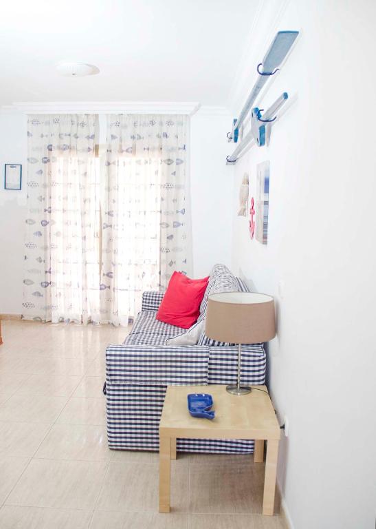 Posteľ alebo postele v izbe v ubytovaní Navy Apartment, El Poris