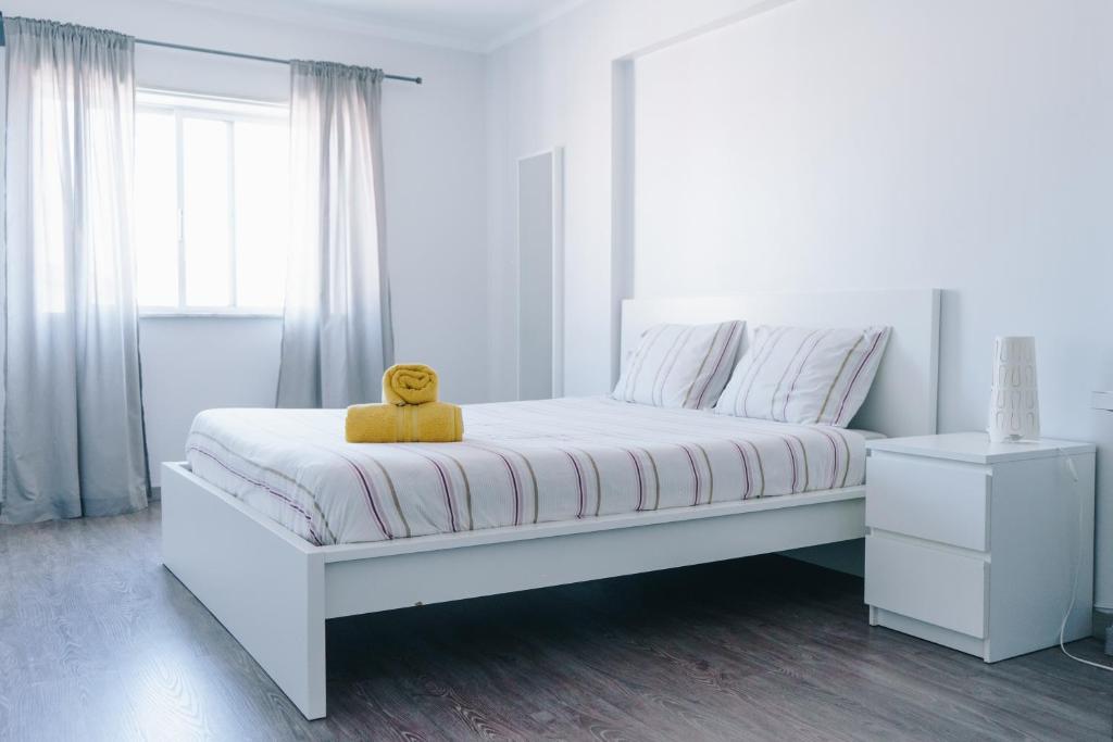 Posteľ alebo postele v izbe v ubytovaní Ocean Guesthouse Peniche