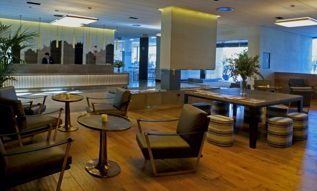 Posezení v ubytování Aravaca Village Hotel
