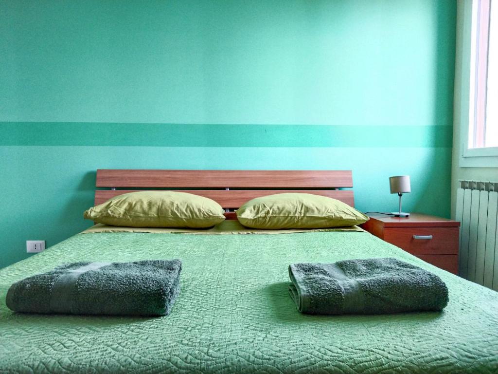 Postel nebo postele na pokoji v ubytování Casa Bignardi - Affitti Brevi Italia