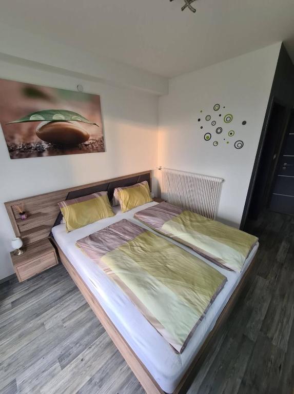 Postel nebo postele na pokoji v ubytování Orchidea2