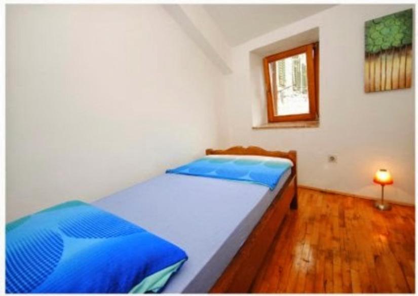 Posteľ alebo postele v izbe v ubytovaní Apartment Center Old Town - 1min to palace