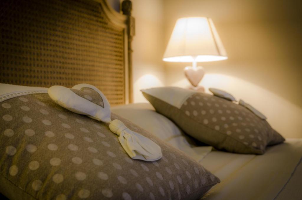 Postel nebo postele na pokoji v ubytování Maison Liparlati