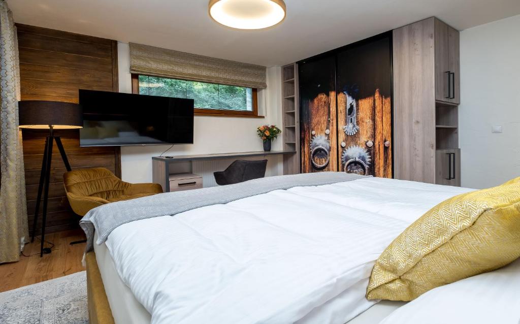 Postel nebo postele na pokoji v ubytování Apartman Stella