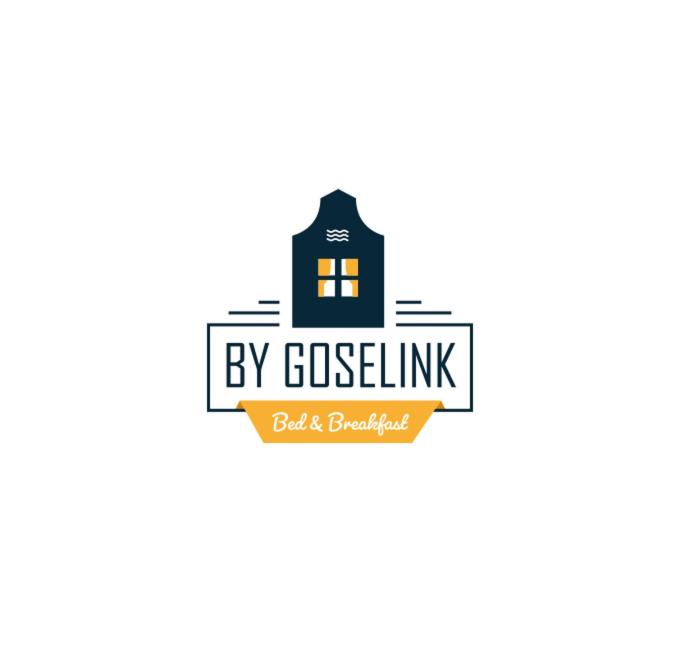 a logo for a restaurant with a house at By Goselink in Alkmaar
