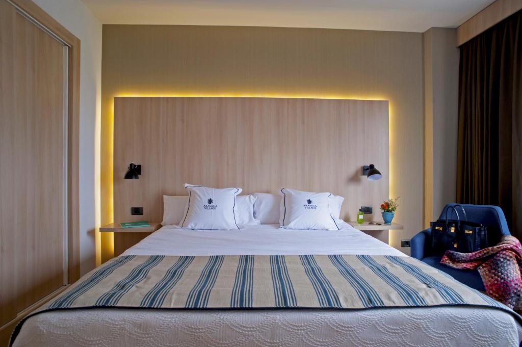 Postel nebo postele na pokoji v ubytování Aravaca Village Hotel