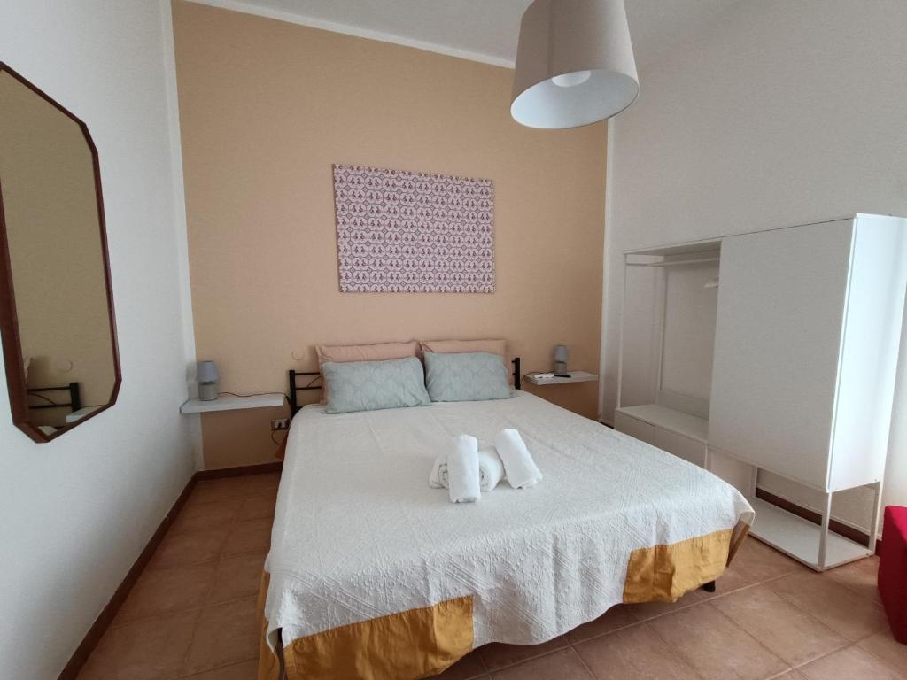 A bed or beds in a room at Hospiton Home
