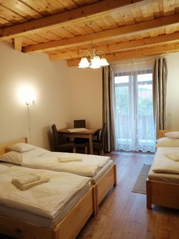 Posteľ alebo postele v izbe v ubytovaní Zempléni Tündérkert vendégház