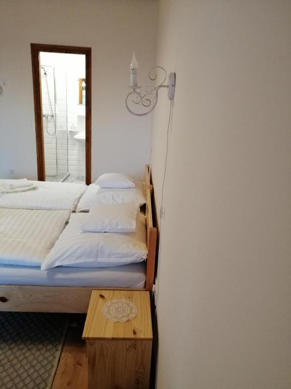 Posteľ alebo postele v izbe v ubytovaní Zempléni Tündérkert vendégház