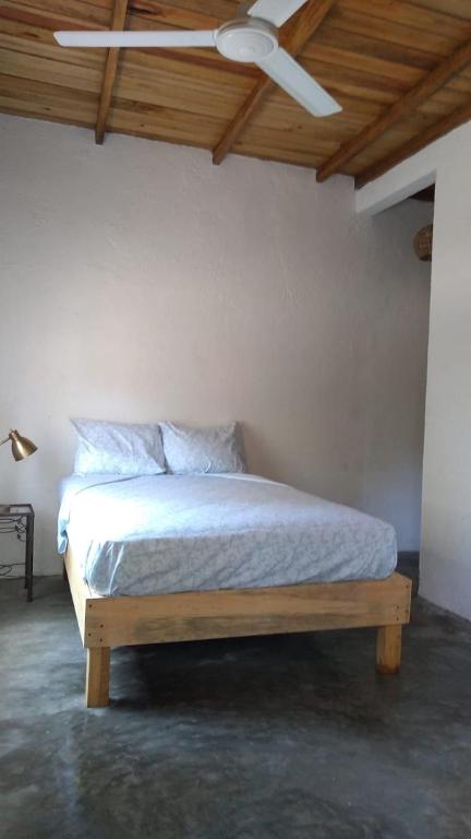 Letto o letti in una camera di Casa de Kai Mazunte