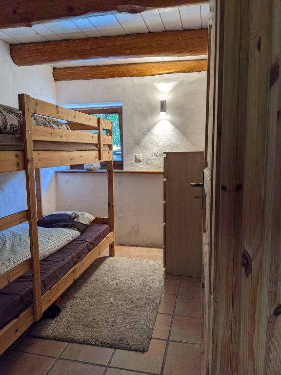 Postel nebo postele na pokoji v ubytování Rustico Tello