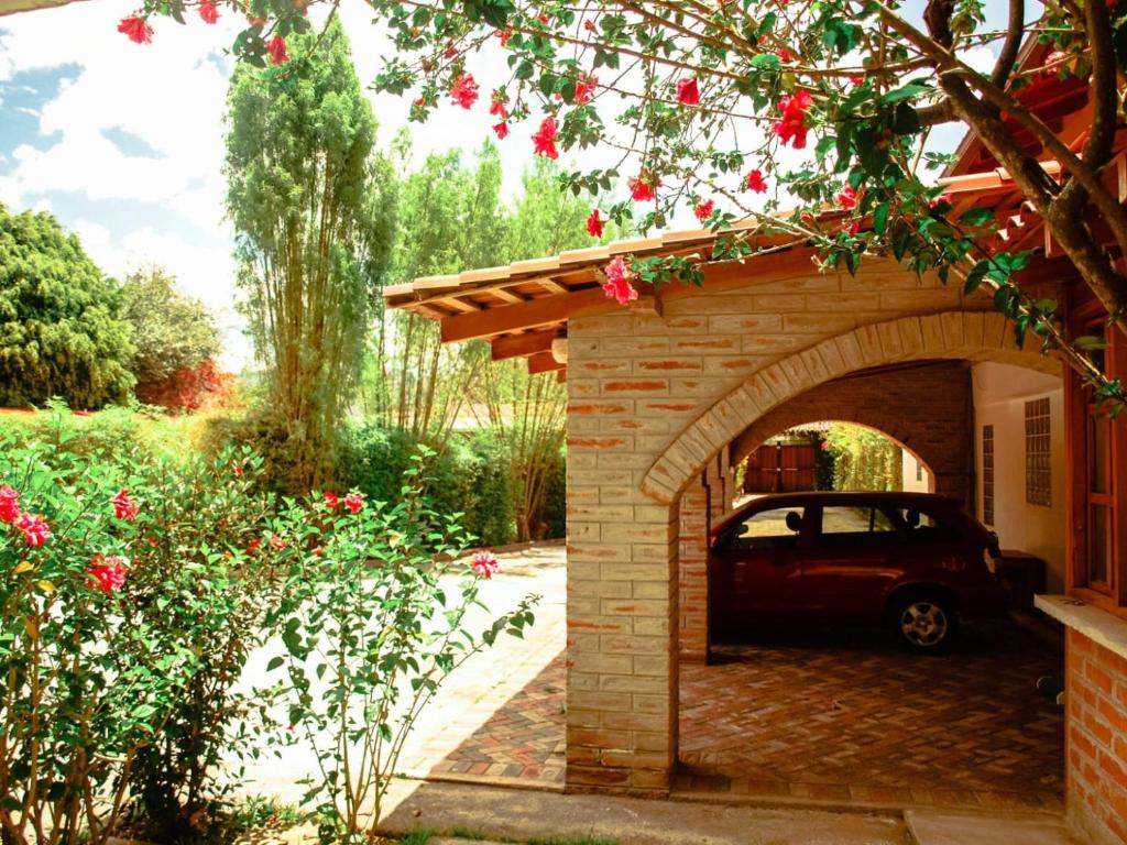 a car is parked in a brick garage at Bamboo Village Place in Tumbaco
