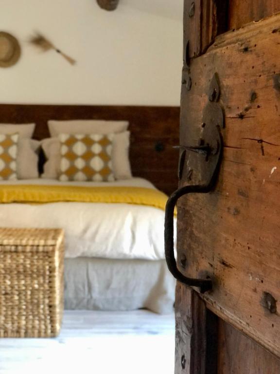 Postel nebo postele na pokoji v ubytování L'Autre Maison
