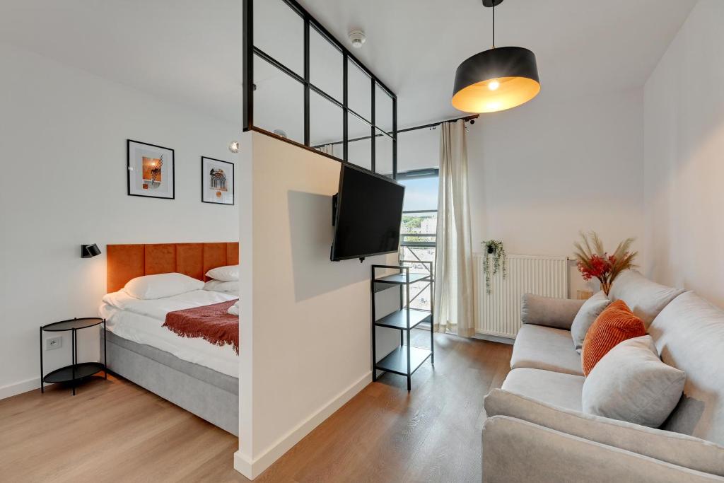 Postel nebo postele na pokoji v ubytování Dom & House - Apartments Dwie Motławy