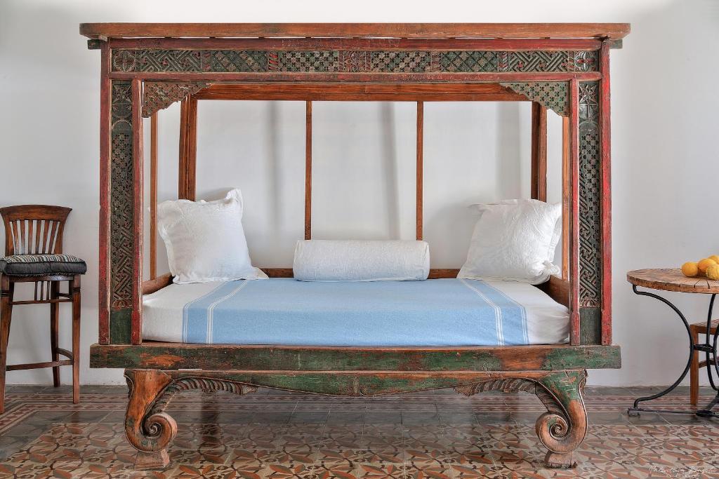 Postel nebo postele na pokoji v ubytování Casa del gelso bianco
