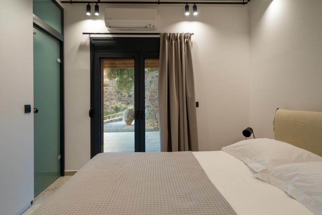 Postel nebo postele na pokoji v ubytování Celine Private Residences