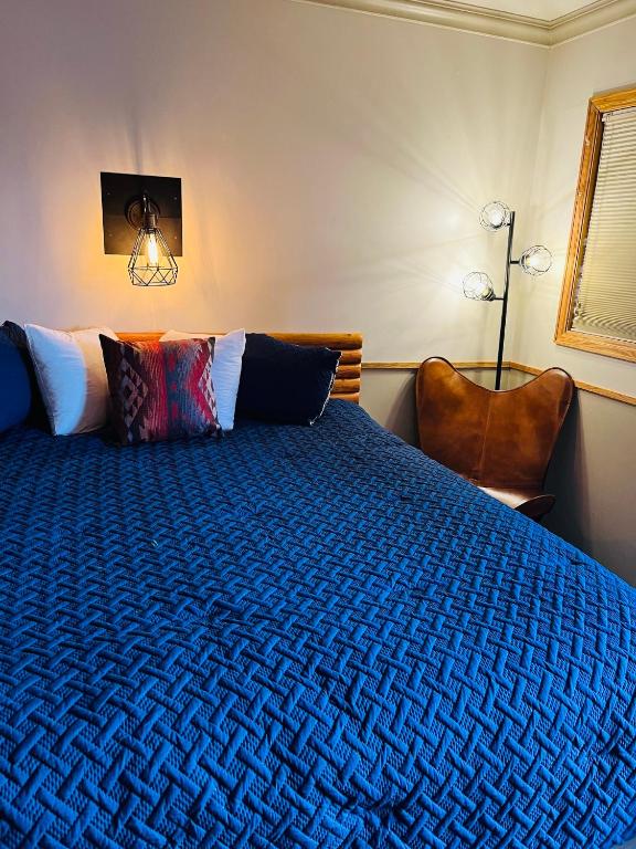 Postel nebo postele na pokoji v ubytování Sundance Motel