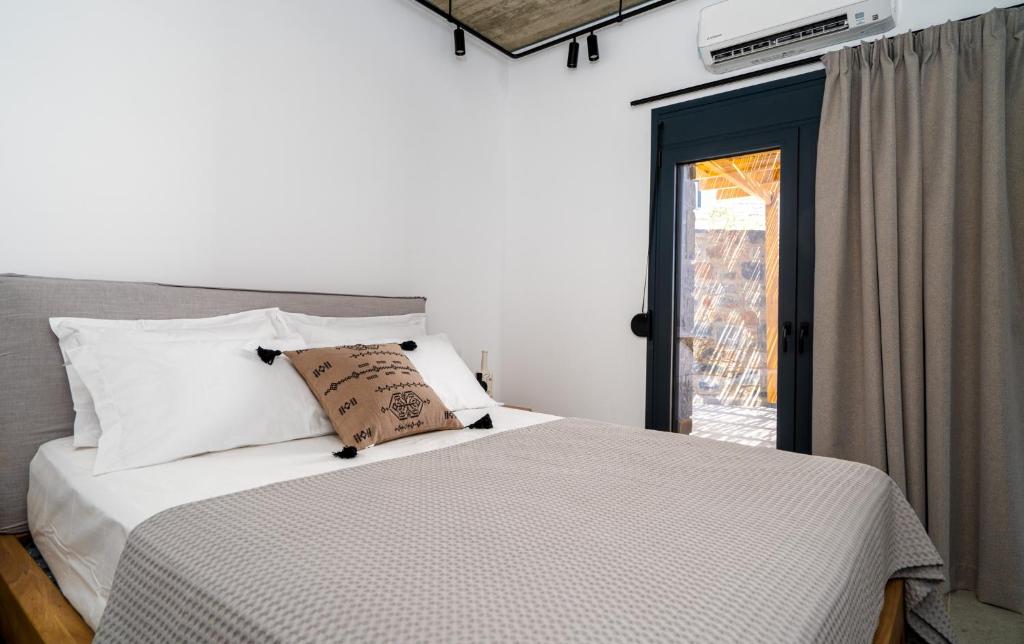 Postel nebo postele na pokoji v ubytování Celine Private Residences