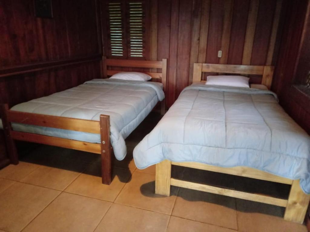 Postel nebo postele na pokoji v ubytování Pochotel