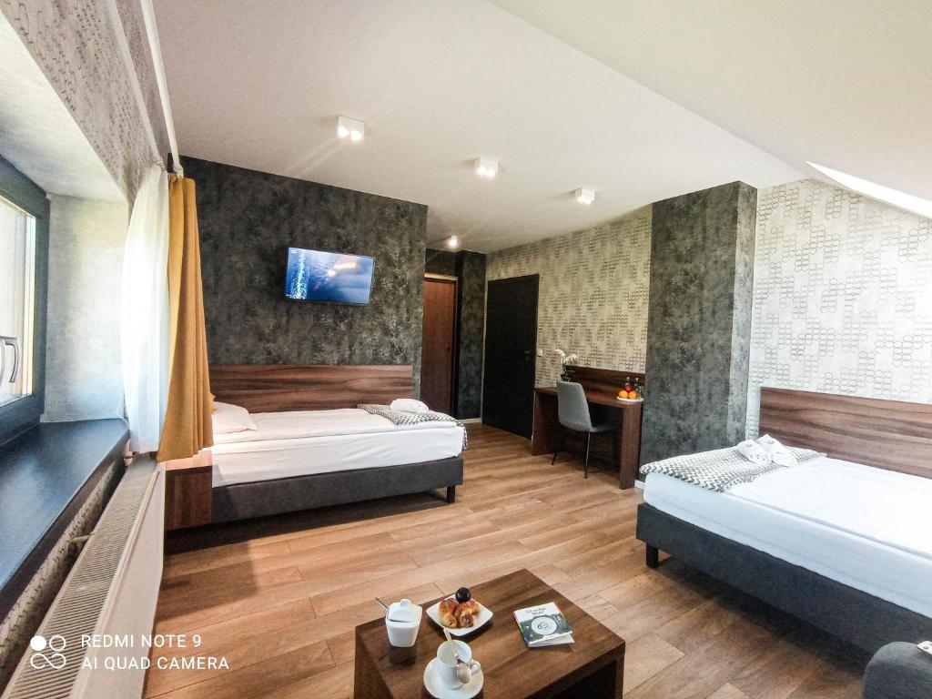 Postel nebo postele na pokoji v ubytování Willa Monte