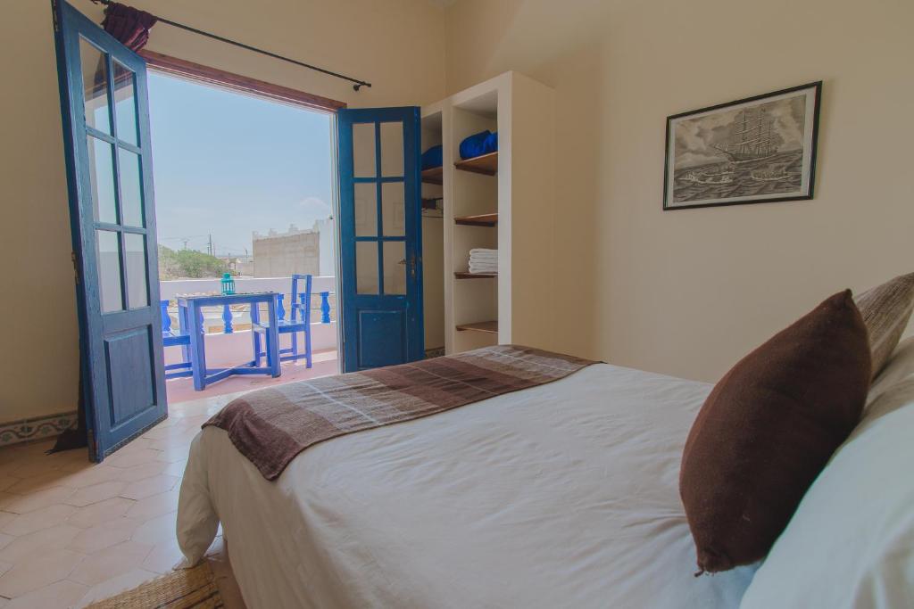 Postel nebo postele na pokoji v ubytování Auberge du Marabout