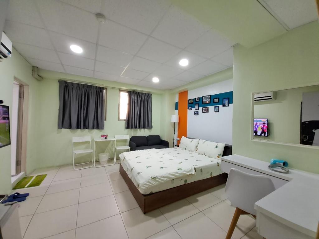 TV a/nebo společenská místnost v ubytování Ming House