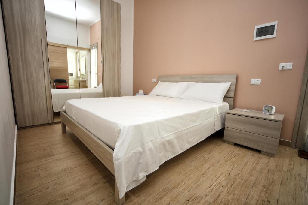 Posteľ alebo postele v izbe v ubytovaní B&B Bouganville