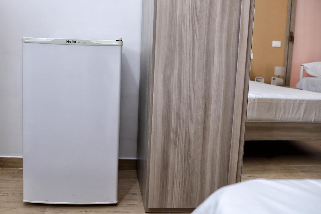Posteľ alebo postele v izbe v ubytovaní B&B Bouganville