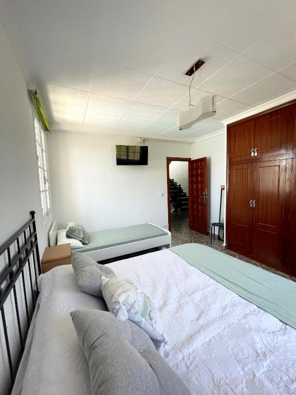Postel nebo postele na pokoji v ubytování Villafavorita Casa Rural