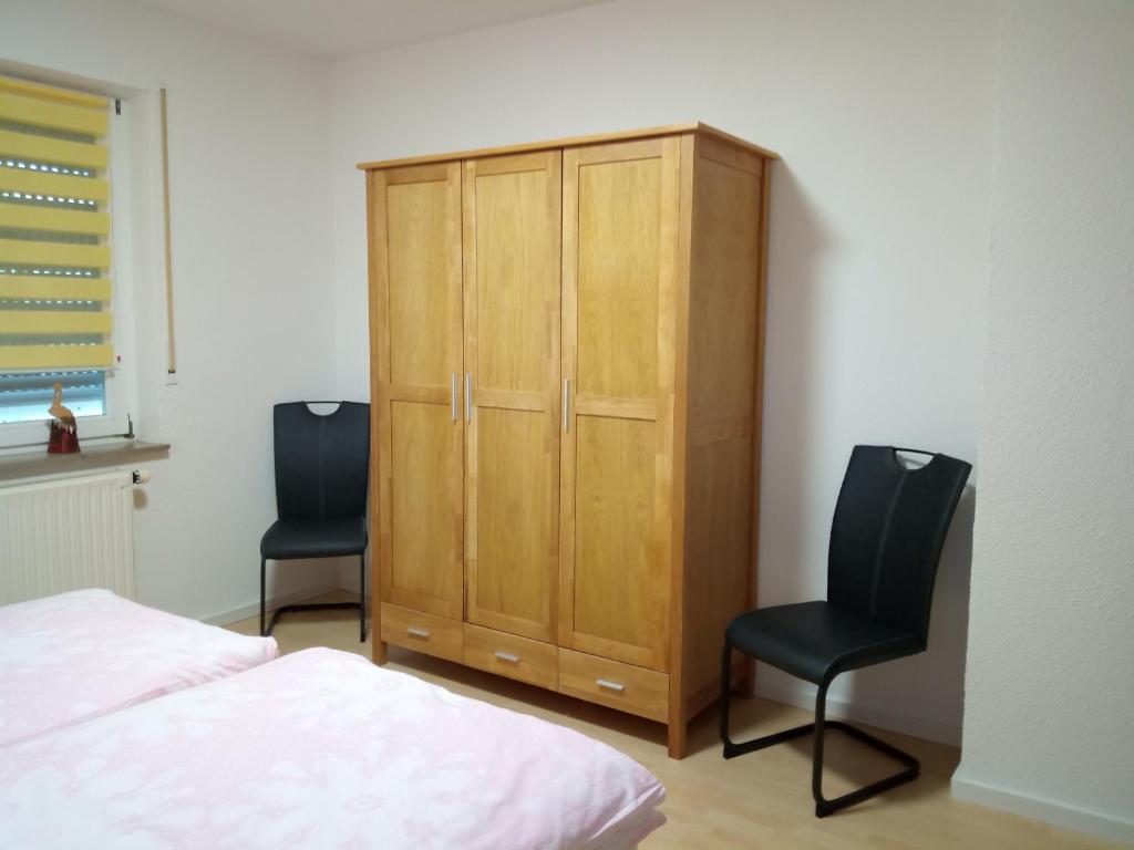Postel nebo postele na pokoji v ubytování Ferienwohnung Schwalbennest
