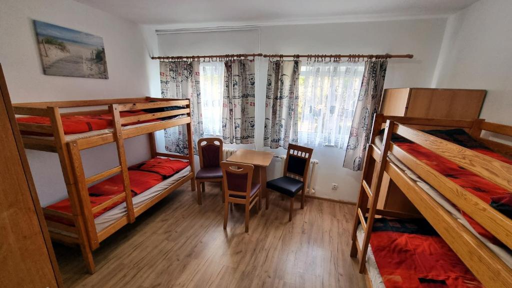 Posteľ alebo postele v izbe v ubytovaní Ośrodek BEATA / FIORD