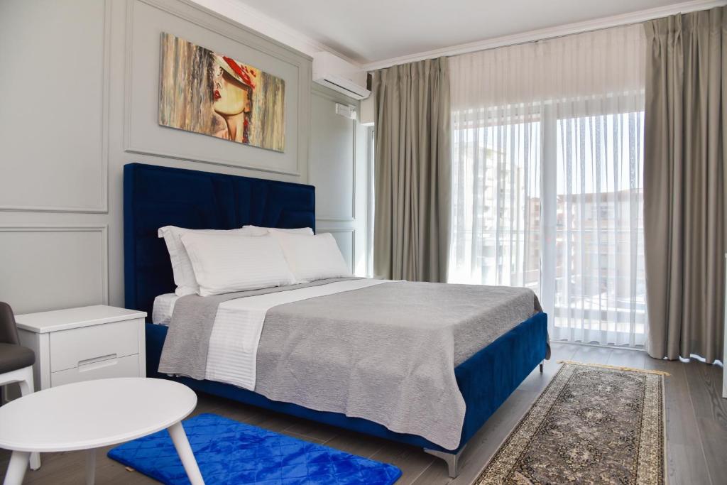 Postel nebo postele na pokoji v ubytování Hotel Imperiale