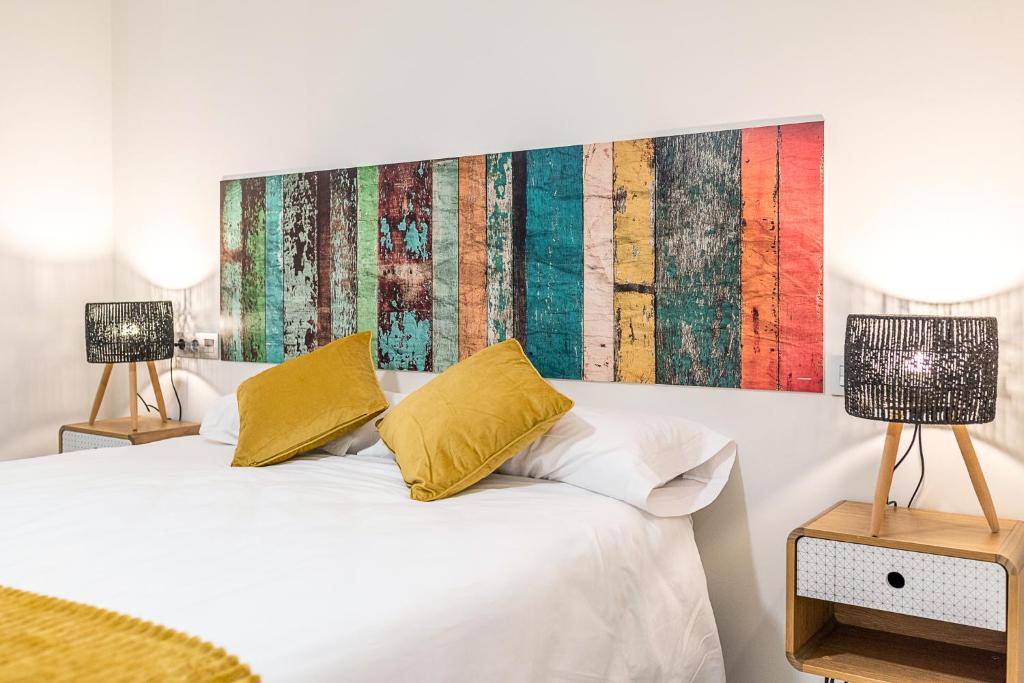Posteľ alebo postele v izbe v ubytovaní Moderno apartamento Centro Granada