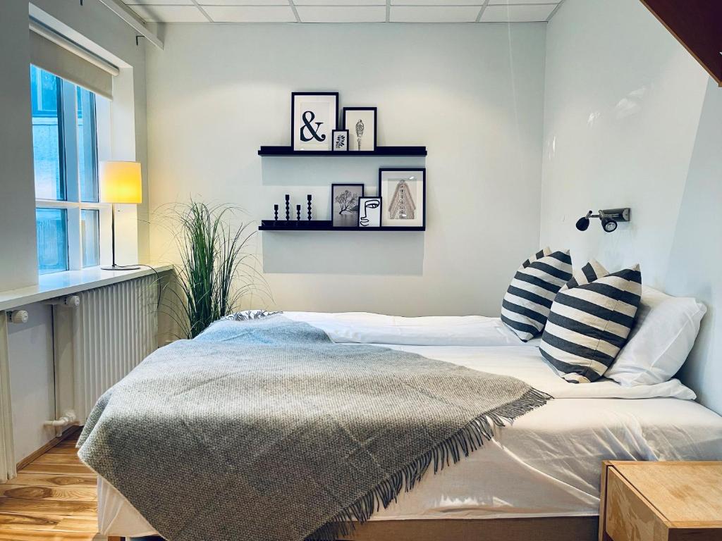 Postel nebo postele na pokoji v ubytování Day Dream Vesturgata 17 Reykjavik