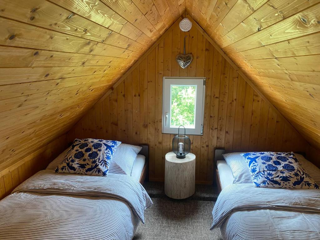 Postel nebo postele na pokoji v ubytování Apartmany Silver