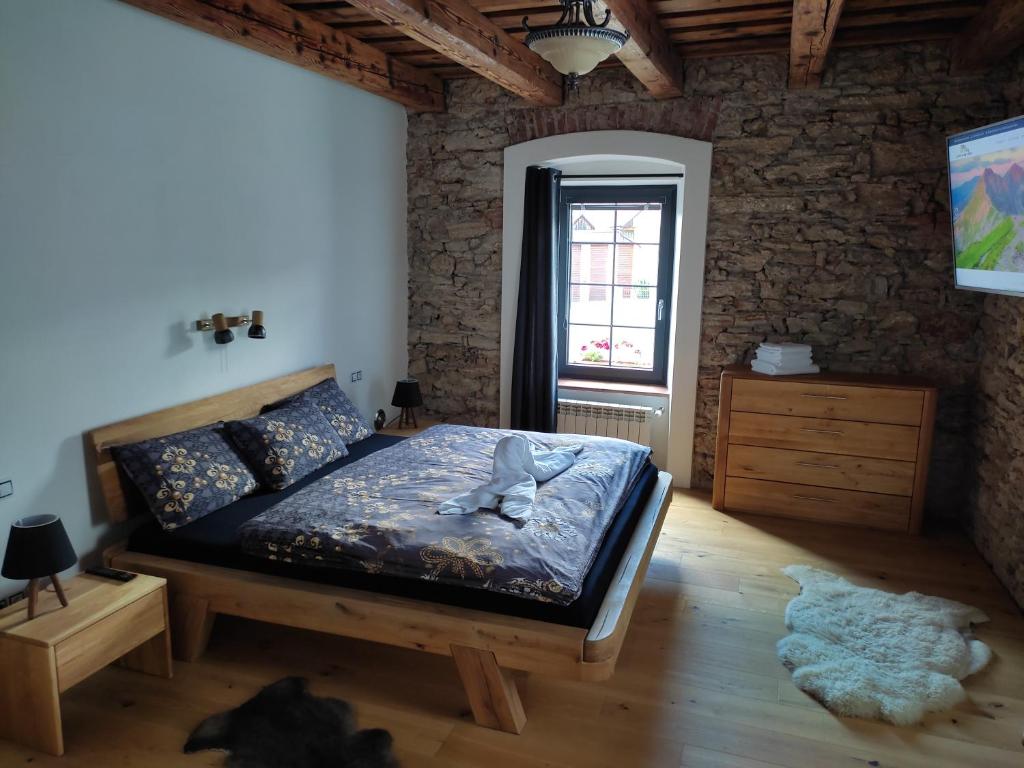Letto o letti in una camera di Liptovský mlyn