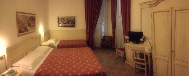 Posteľ alebo postele v izbe v ubytovaní Hotel Umbria