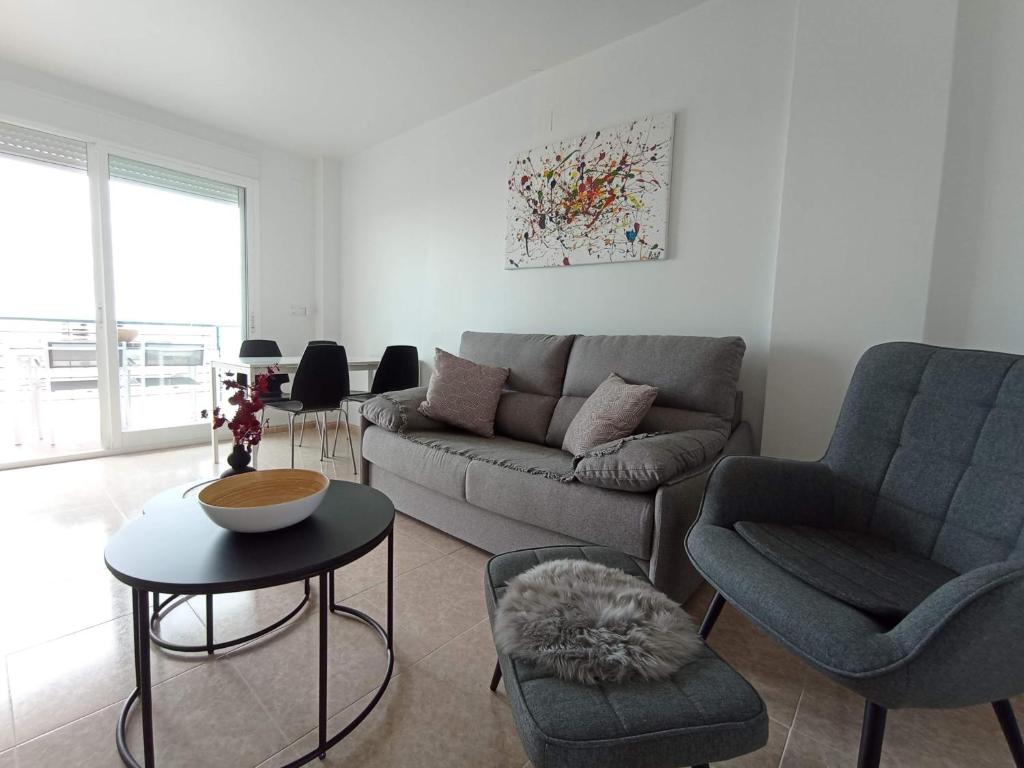 A seating area at Duplex appartement Arabella