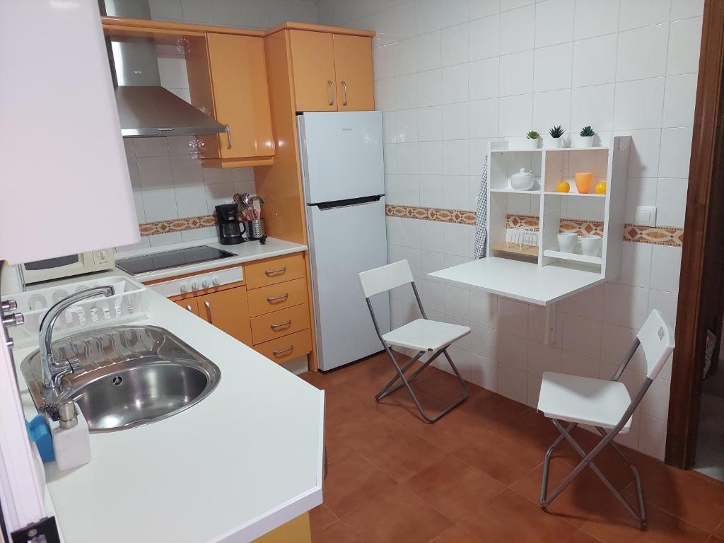 Kuchyňa alebo kuchynka v ubytovaní Ático Vacacional Manzanilla