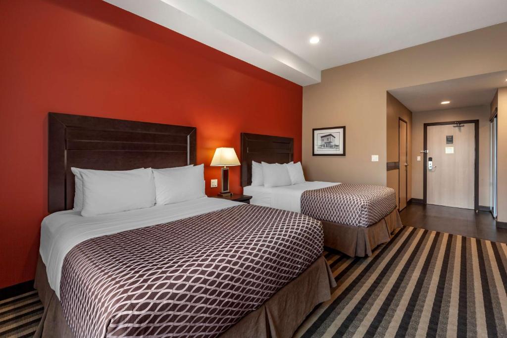 Postel nebo postele na pokoji v ubytování Best Western Plus Meridian