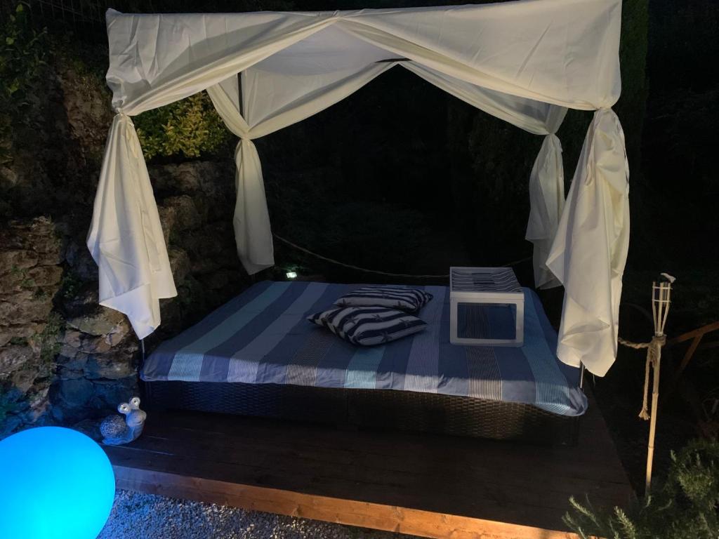 Postel nebo postele na pokoji v ubytování IL PICCOLO PARADISO