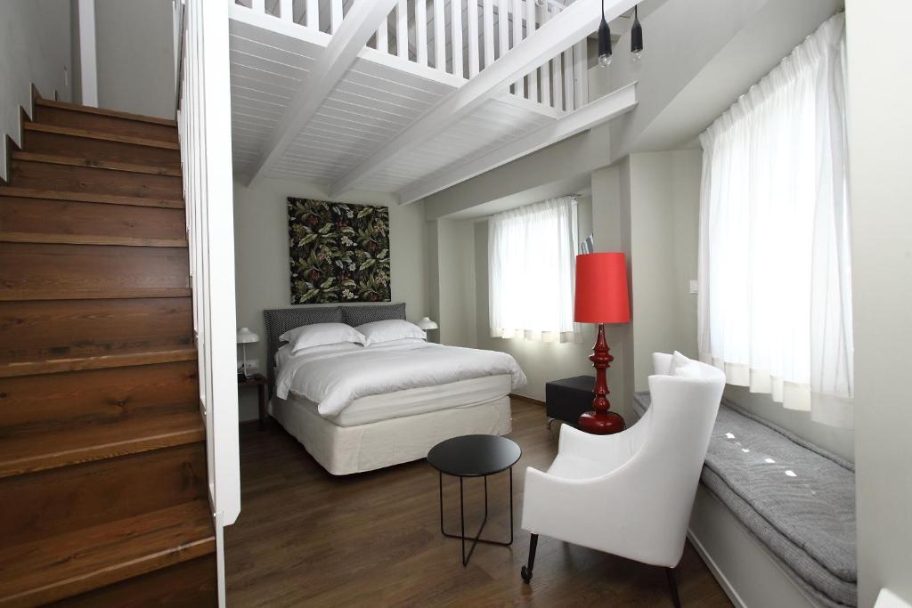 Postel nebo postele na pokoji v ubytování Hotel Metropolis