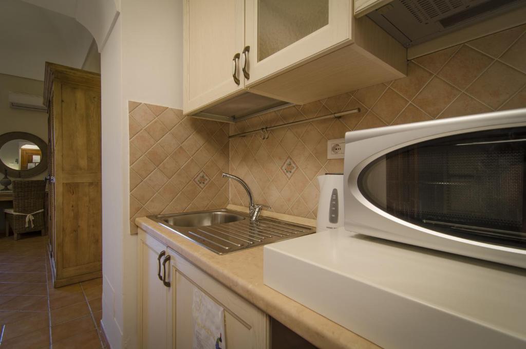 Kuchyň nebo kuchyňský kout v ubytování Maison Liparlati