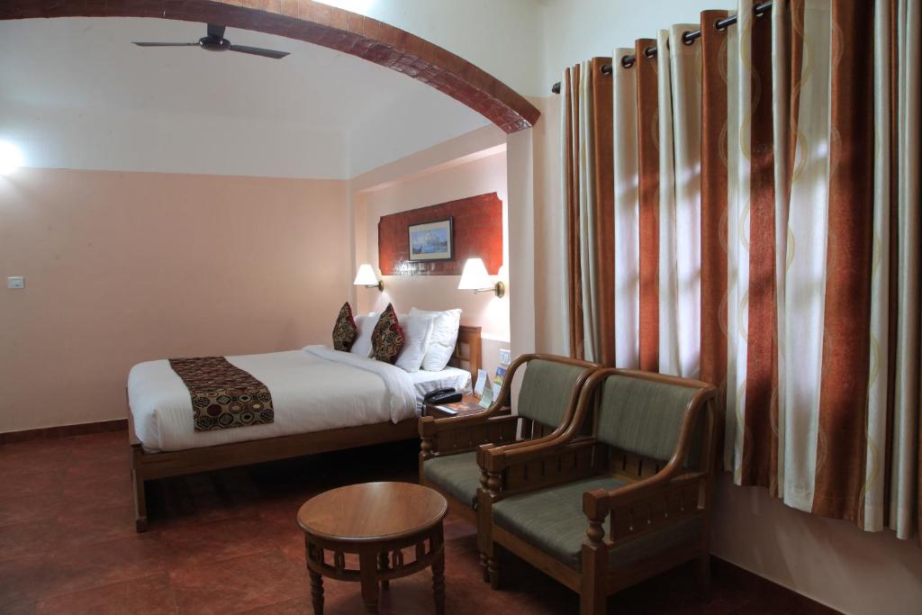 Postel nebo postele na pokoji v ubytování Cherai Beach Resorts