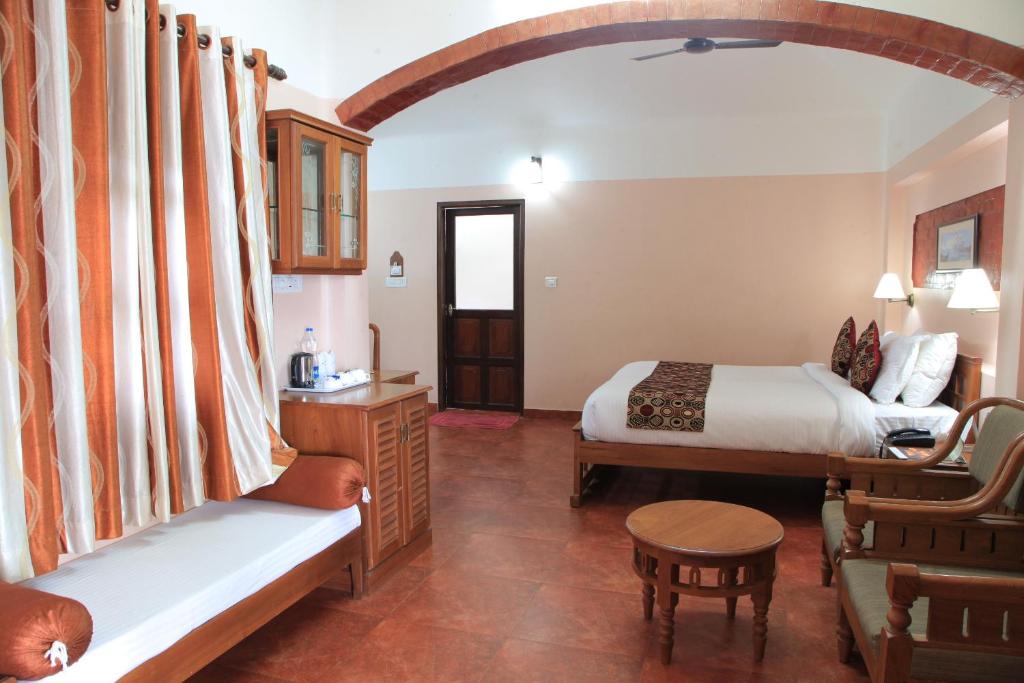 Postel nebo postele na pokoji v ubytování Cherai Beach Resorts
