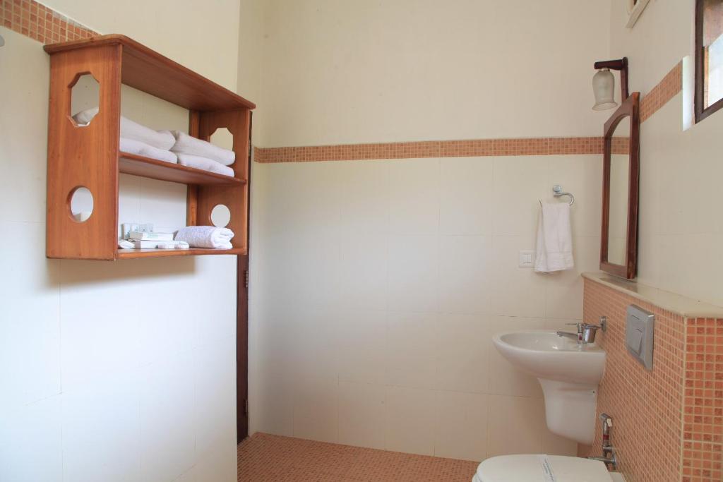 Koupelna v ubytování Cherai Beach Resorts